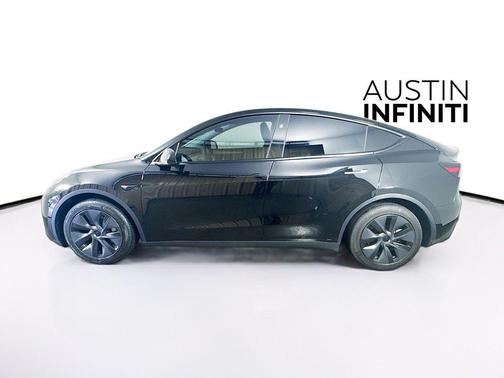 Solid Black 2025 Tesla Model Y Long Range Dual Motor Rear-Wheel Drive