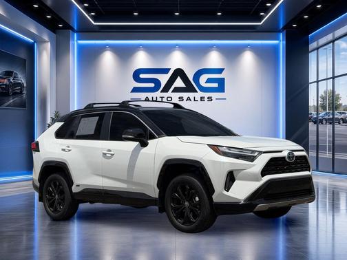 Wind Chill Pearl/Midnight Black Metallic 2024 Toyota RAV4 Hybrid SE