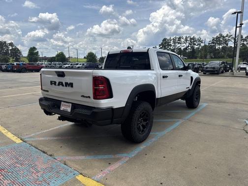 Bright White Clearcoat 2026 RAM 1500 RHO Crew Cab 4x4 5'7' Box