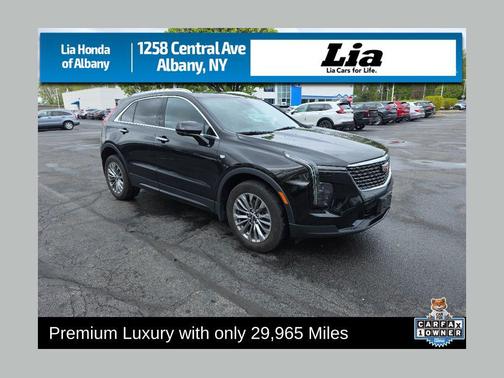 Stellar Black Metallic 2024 Cadillac XT4 Premium Luxury