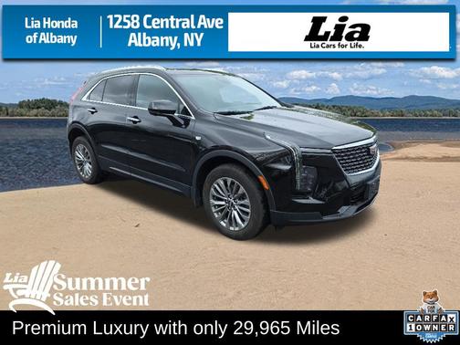 Stellar Black Metallic 2024 Cadillac XT4 Premium Luxury