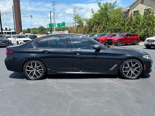 Black Sapphire Metallic 2023 BMW M550 i xDrive