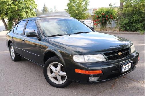 Green 1997 Nissan Maxima GXE