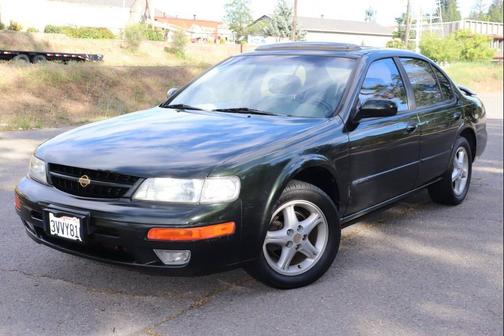 Green 1997 Nissan Maxima GXE