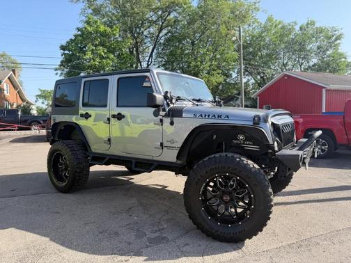 Silver 2014 Jeep Wrangler Unlimited Sport