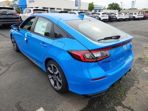 Blue 2026 Honda Civic Hybrid Sport Touring