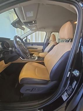 Aurora Black Pearl 2023 Kia Carnival LX Seat Package