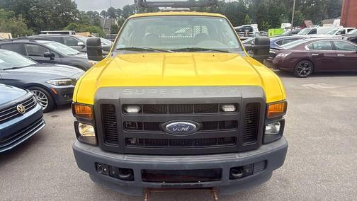 Yellow 2010 Ford F-350 4X4 4dr Crew Cab 156.2 172.4 in. WB