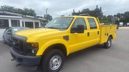 Yellow 2010 Ford F-350 4X4 4dr Crew Cab 156.2 172.4 in. WB