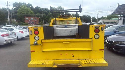 Yellow 2010 Ford F-350 4X4 4dr Crew Cab 156.2 172.4 in. WB