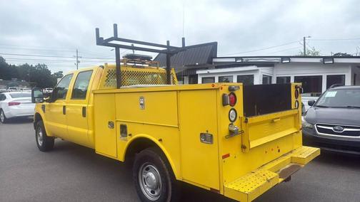 Yellow 2010 Ford F-350 4X4 4dr Crew Cab 156.2 172.4 in. WB