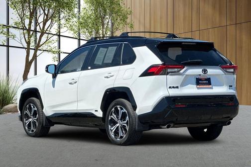 Wind Chill Pearl/Midnight Black Metallic 2025 Toyota RAV4 Hybrid SE