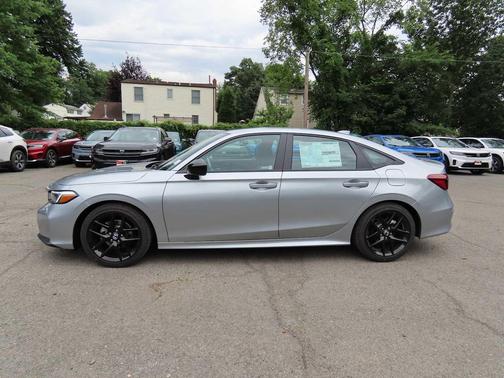 Solar Silver Metallic 2026 Honda Civic Sport