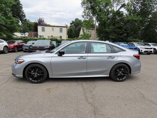 Solar Silver Metallic 2026 Honda Civic Sport