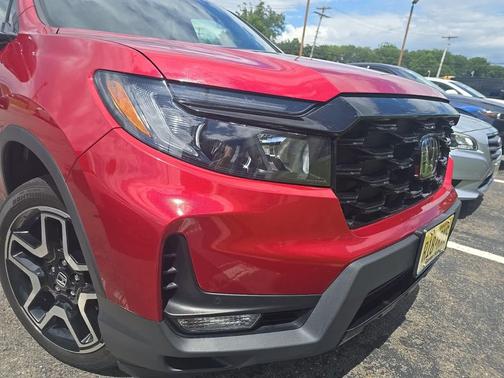 Radiant Red Metallic II 2023 Honda Passport AWD Elite