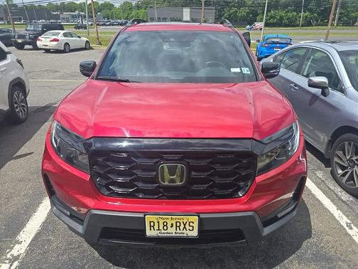 Radiant Red Metallic II 2023 Honda Passport AWD Elite