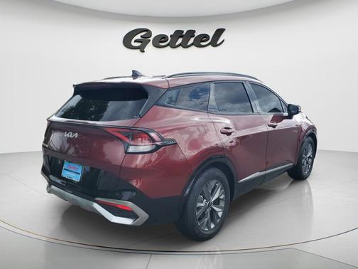 Dawning Red 2023 Kia Sportage SX