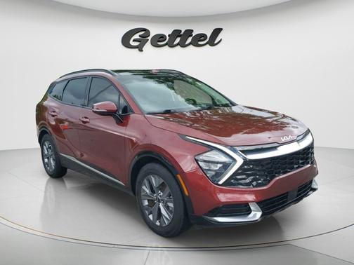 Dawning Red 2023 Kia Sportage SX