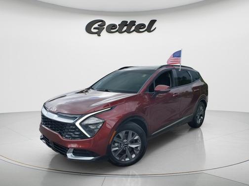 Dawning Red 2023 Kia Sportage SX