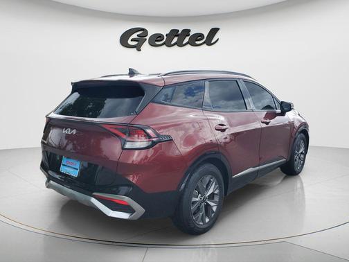 Dawning Red 2023 Kia Sportage SX