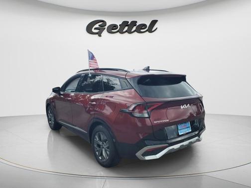 Dawning Red 2023 Kia Sportage SX
