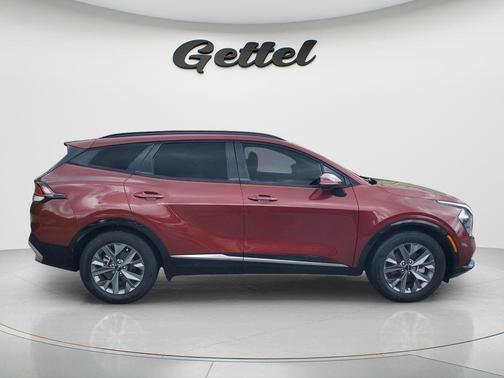 Dawning Red 2023 Kia Sportage SX