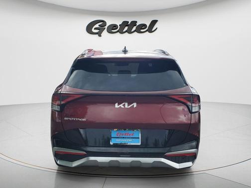 Dawning Red 2023 Kia Sportage SX