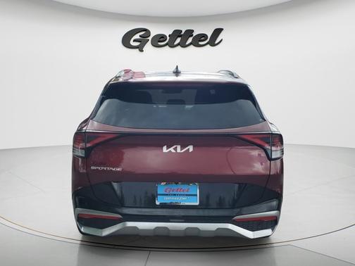 Dawning Red 2023 Kia Sportage SX