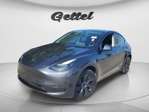 Solid Black 2025 Tesla Model Y Long Range Dual Motor Rear-Wheel Drive