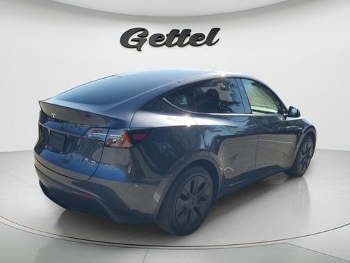 Solid Black 2025 Tesla Model Y Long Range Dual Motor Rear-Wheel Drive