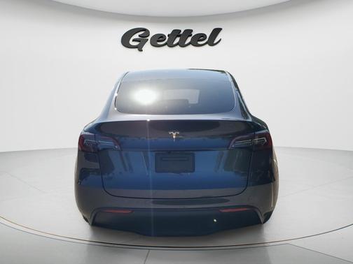 Solid Black 2025 Tesla Model Y Long Range Dual Motor Rear-Wheel Drive