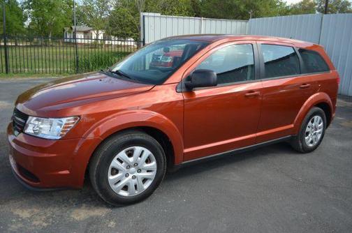 Orange 2014 Dodge Journey SE