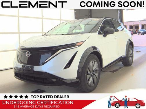 Everest White Pearl Tricoat/Black Diamond Pearl 2023 Nissan ARIYA VENTURE+
