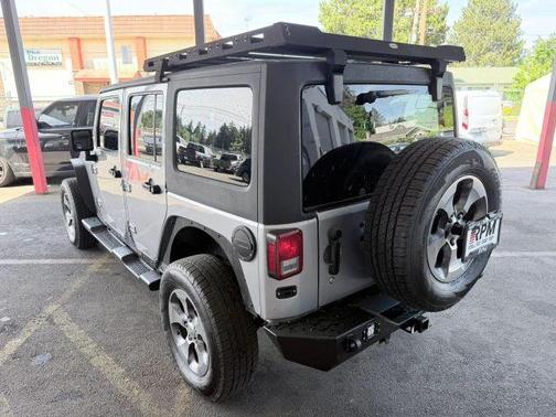 Gray 2016 Jeep Wrangler Unlimited Sahara