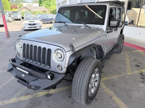 Gray 2016 Jeep Wrangler Unlimited Sahara