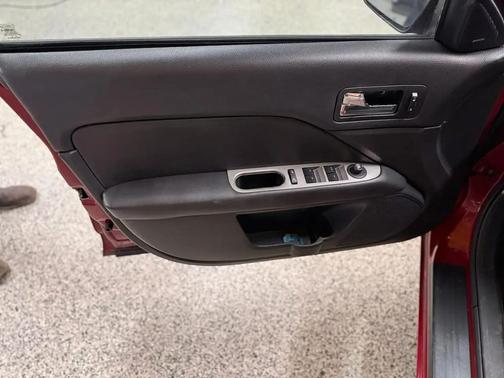 Red 2010 Ford Fusion SEL