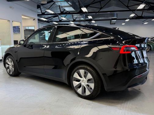 Solid Black 2024 Tesla Model Y Long Range Dual Motor All-Wheel Drive