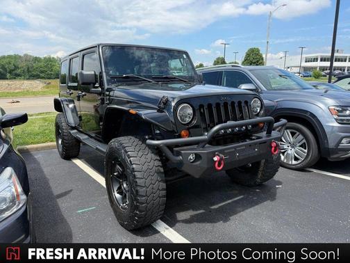 Black Clearcoat 2013 Jeep Wrangler Unlimited Sahara