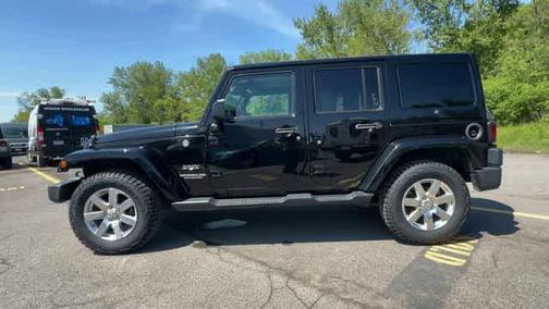 Black 2016 Jeep Wrangler Unlimited Sahara