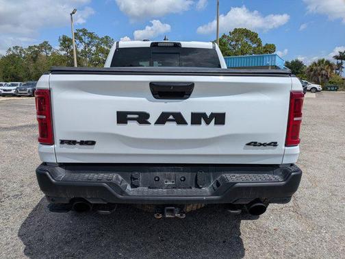 Bright White Clearcoat 2025 RAM 1500 RHO Crew Cab 4x4 5'7' Box