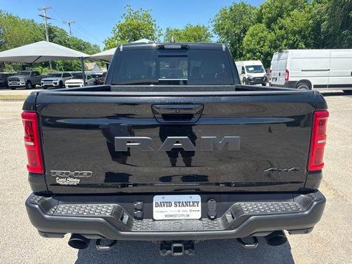 Diamond Black Crystal Pearlcoat 2026 RAM 1500 RHO Crew Cab 4x4 5'7' Box