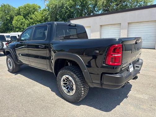Diamond Black Crystal Pearlcoat 2026 RAM 1500 RHO Crew Cab 4x4 5'7' Box