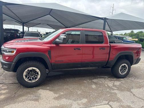 Molten Red 2026 RAM 1500 RHO Crew Cab 4x4 5'7' Box