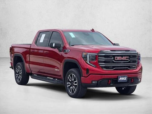 Volcanic Red Tintcoat 2025 GMC Sierra 1500 AT4
