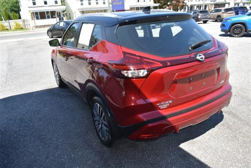 RED 2024 Nissan Kicks SV