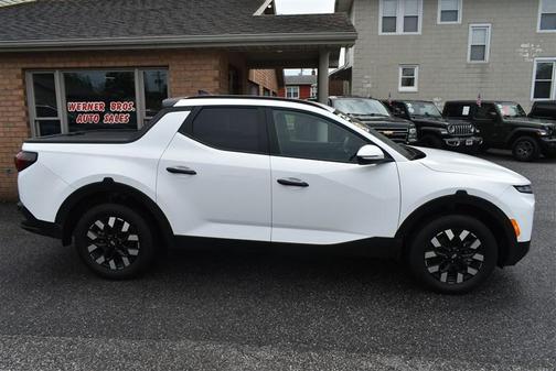 Atlas White 2025 Hyundai SANTA CRUZ SEL Activity