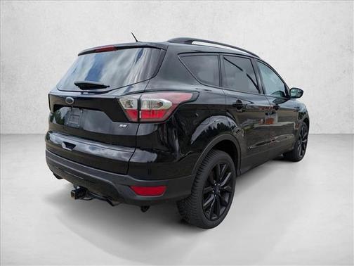 Ruby Red Metallic Tinted Clearcoat 2017 Ford Escape SE
