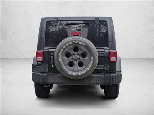Black Clearcoat 2014 Jeep Wrangler Unlimited Sahara