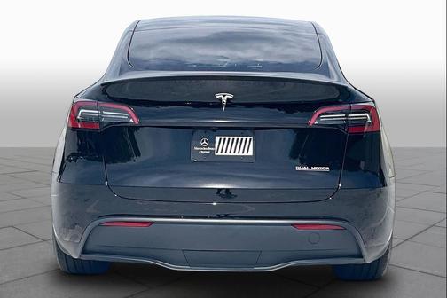 Solid Black 2025 Tesla Model Y Performance Dual Motor All-Wheel Drive