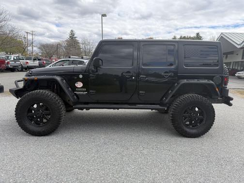 Black Clearcoat 2011 Jeep Wrangler Unlimited Sport